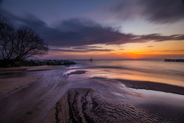 Fototapeta premium Amazing sunrise over wooden pier in Gdynia Orlowo.