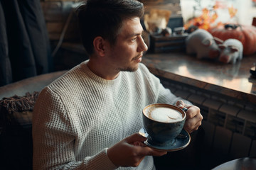 young romantic man waiting for magic time, he thinks that he will meet his love at New year, belief, close up photo .art.