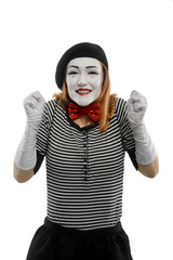 Portrait of delighted female mime, isolated on white