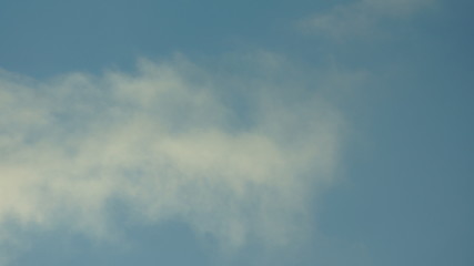 Cumulus and Cirrus clouds in a blue sky