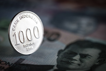 Indonesian rupiah coin and bills. Close-up stock photo