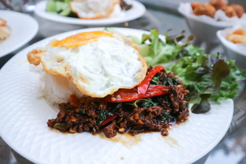 stir fried pork with holy basil or Rice topped with stir fried pork