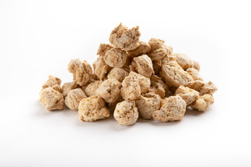 Heap of dry soy meat isolated on white background