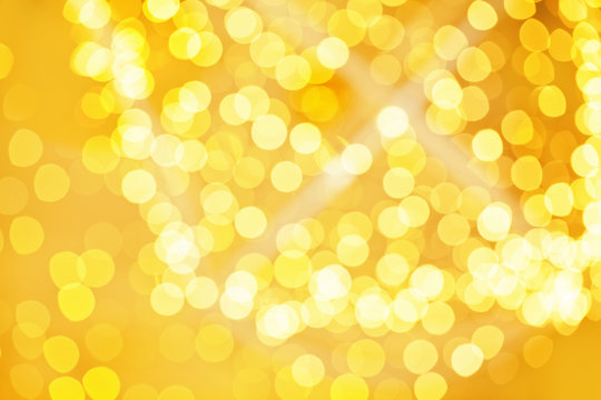 Glitter golden bokeh background for holiday