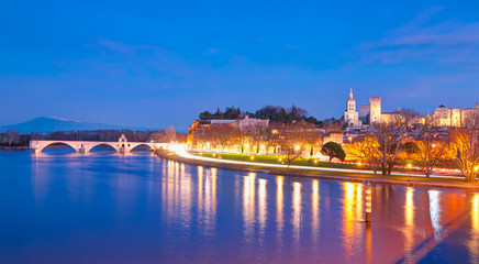 Avignon Bridge with Popes Palace on the Rhone River at at twilight blue hour - Pont Saint - Benezet, Provence, France