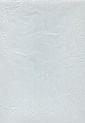 crumpled transparent polyethylene texture on a white background