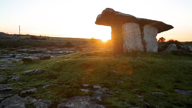 Left to right slow panning motion of the Poulnabrone Dolmen, this ancient Portal Tomb was constructed from great slabs of limestone over 5000 years ago, ancient burial site in County Clare,Ireland
