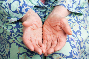 Hands of an old woman