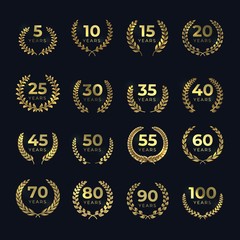 Obraz premium Golden anniversary laurel wreaths. Birthday gold symbol set with laurels leaf shapes. Vector template emblem for achievement award
