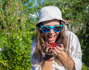 hands holding fresh berries in nature day