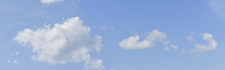 Obraz premium panoramic blue sky background with white clouds