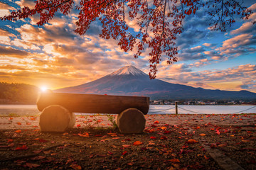 Mt. Fuji over Lake Kawaguchiko with autumn foliage at sunrise in Fujikawaguchiko, Japan.