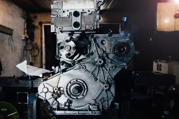 car in-line engine repair, disassembled motor.