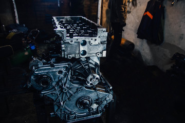 car in-line engine repair, disassembled motor.
