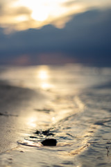Sea ocean landscape at sunset with volumetric light (god rays) Baltic shore coast at dusk