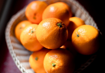Basket of fresh and natural oranges
