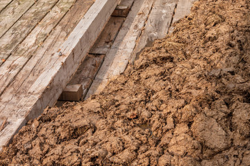 natural cows manure used to fertilize mountain pasture in South Tirol in late autumn