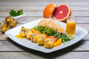 Original sweet rolls, Japanese-style dessert, rolls with sweet cheese and mango sauce.