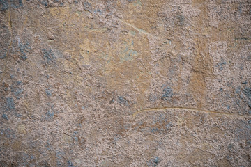 Texture of an old wall covered with paint. Background image of a worn paint coated surface