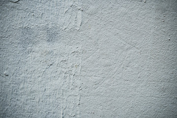 Texture of an old wall covered with paint. Background image of a worn paint coated surface