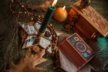 Mystical atmosphere, view of candle on the table, esoteric concept, fortune telling and predictions