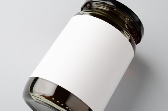 Honey jar mockup with blank label. Closeup.