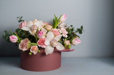 Large beautiful bouquet of mixed flowers in woman hand. Floral shop concept . Handsome fresh bouquet. Flowers delivery.