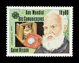 Cancelled postage stamp printed by Guinea Bissau, that shows portrait of scientists Bell, circa...