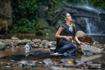 Beautyful Thai woman wearing thai traditional clothing