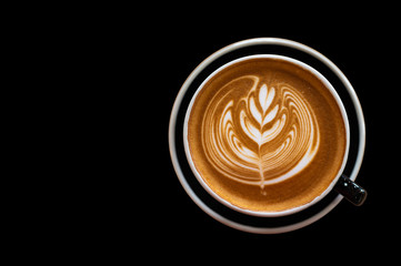 Beautiful of Latte art coffee cup on black background, Flat lay