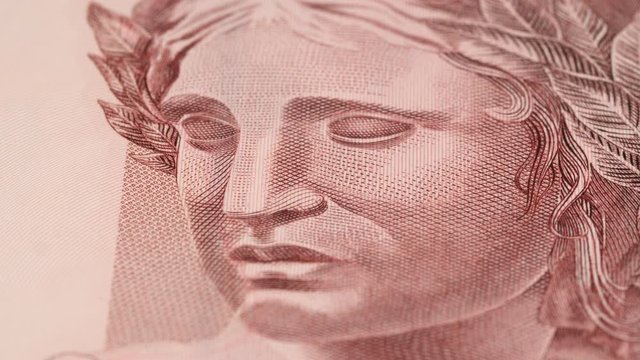 Republic's Effigy on Brazil 10 real banknote rotating. Brazilian currency. Low angle, macro. 4K, 422 10 bit