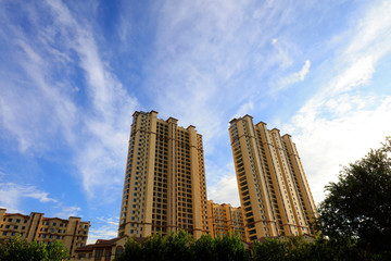 Fototapeta na wymiar High rise buildings under the blue sky