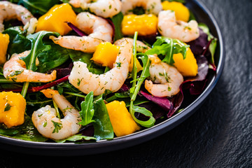 Prawn salad on black stone plate