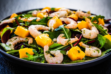 Prawn salad on black stone plate