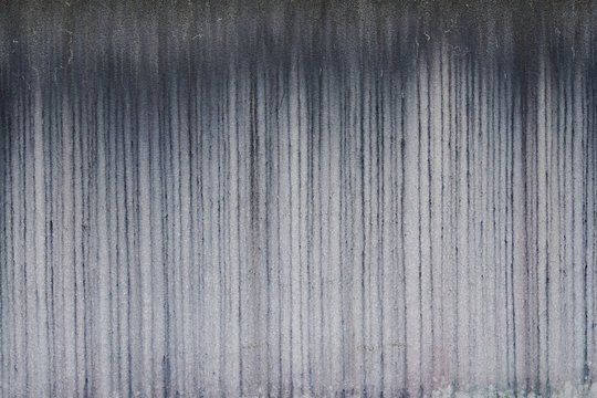 Textured formed concrete grey striated wall background gray surface