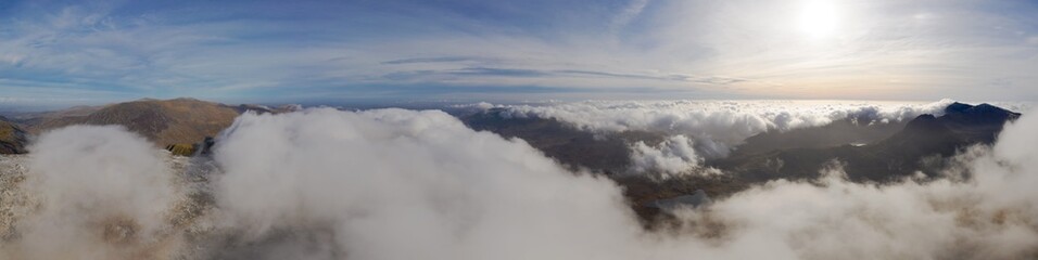 Fototapeta na wymiar Panoramic view of Snowdonia in Wales UK with Mount Snowdon and a cloud inversion