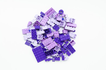 Top view of Pile of Purple Bricks Blocks isolated on white background