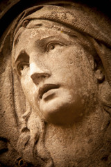 Bottom view of Virgin Mary. Fragment of ancient statue.