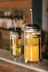 colored cocktails by the bar