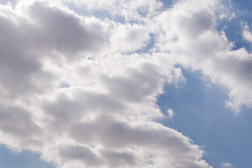 Image Of Clouds In The Sky. blue sky background with tiny clouds