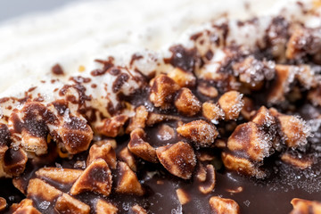 Ice cream with chocolate coating and peanut crumb