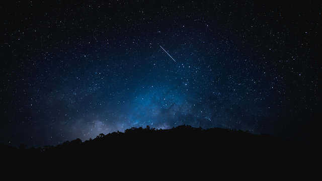 beautiful night sky with milky way between lot of star and meteor on february 2020