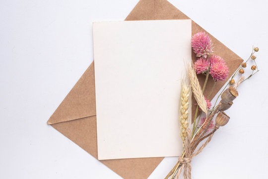 Card Mockup With Dry Flowers And Envelope. Invitation 