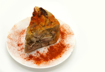 Traditional Romanian homemade pork trotter jelly dish called piftie. Jellied pork aspic made with pork meat served with paprika and fresh parsley.