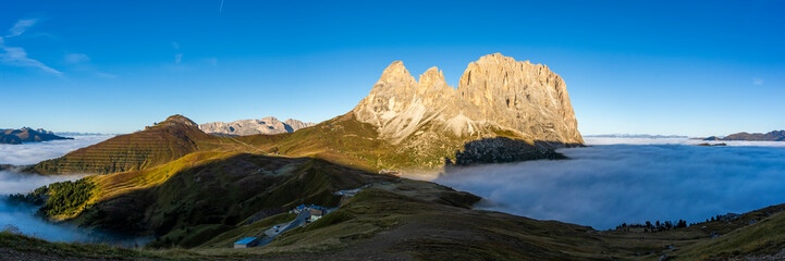 Panorama of cloud sea at Sella mountain pass between the provinces of Trentino and South Tyrol, Dolomites