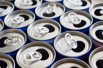 Empty aluminium drink cans recycling background concept