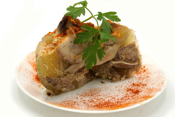 Traditional Romanian homemade pork trotter jelly dish called piftie. Jellied pork aspic made with pork meat served with paprika and fresh parsley.