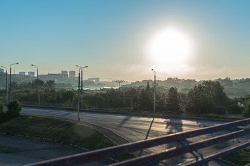 Morning city landscape, empty road