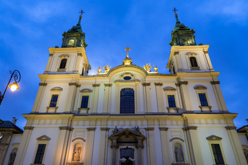Fototapeta na wymiar Church of the Holy Cross at Night in Warsaw