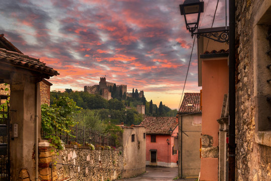 Medieval Castle of Soave in the province of Verona at sunset, Italy